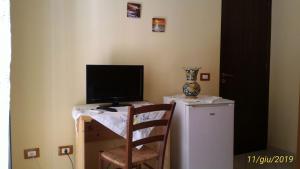 TV a/nebo společenská místnost v ubytování Affitto breve Puccio A Chiazza Realmonte