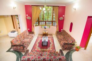 Area soggiorno di LikeMyHome Homestay Mysore