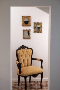 A seating area at ATHENIAN YARD SUITES