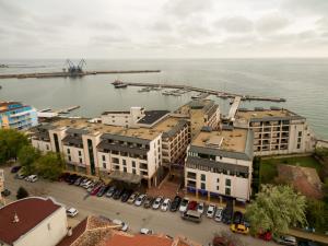 an aerial view of a city with a harbor at Marina City ApartHotel in Balchik