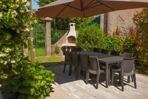 A garden outside Villa Moiacchina Luxury Home
