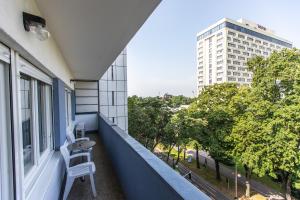 En balkon eller terrasse på Blue Sky Apartment