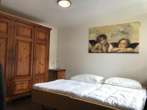 Postel nebo postele na pokoji v ubytování Appartamenti Panorama