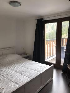 Postel nebo postele na pokoji v ubytování Appartamenti Panorama