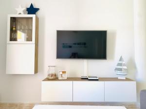 TV a/nebo společenská místnost v ubytování Travesía