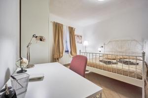 Postel nebo postele na pokoji v ubytování Casa Laurentius