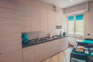 Kuchyň nebo kuchyňský kout v ubytování Oltre il Mare Guest House