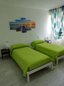 Кровать или кровати в номере Casa Mia