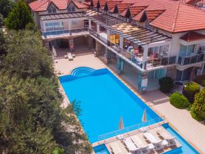 an aerial view of a house with a swimming pool at Number 8 Olivia Apartments in Oludeniz