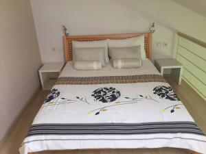 Posteľ alebo postele v izbe v ubytovaní Villa Jani Top Floor Suite