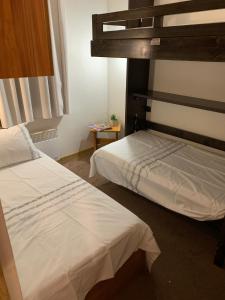 A bed or beds in a room at Val Thorens Temple of the Sun - ski in, ski out