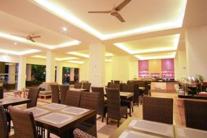Ресторант или друго място за хранене в Sunwood Hotel Arianz Mataram
