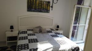 Ένα ή περισσότερα κρεβάτια σε δωμάτιο στο FeWo Lüneburger Heide - Aurelia