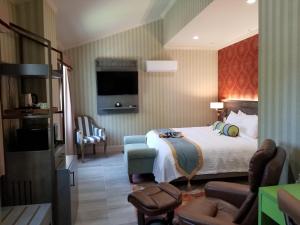TV a/nebo společenská místnost v ubytování SenS Hotel & Vanne Bistro Berkeley