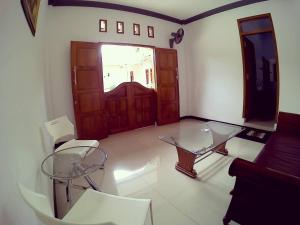 Area soggiorno di Amaryllis Guesthouse Syariah