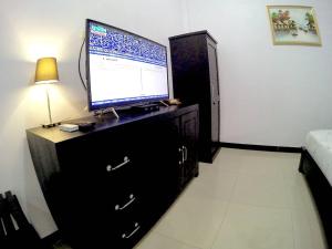 TV o dispositivi per l'intrattenimento presso Amaryllis Guesthouse Syariah