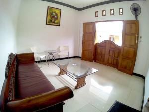 Area soggiorno di Amaryllis Guesthouse Syariah