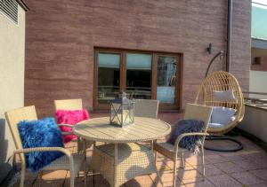 Patio alebo iná vonkajšia časť ubytovania Apartamenty Kora