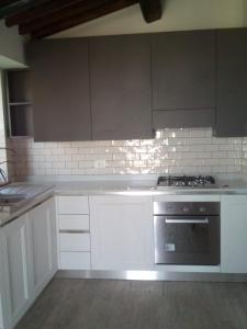 Kuchyň nebo kuchyňský kout v ubytování Casa Renacci