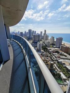 a view from a balcony of a city skyline at OceanView Properties with Widest Balcony in Gold Coast