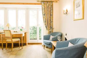Posezení v ubytování Boutique Hotel SEITNER HOF München Pullach