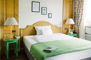 Postel nebo postele na pokoji v ubytování Boutique Hotel SEITNER HOF München Pullach