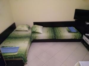 A bed or beds in a room at Apartment Nedyalkov