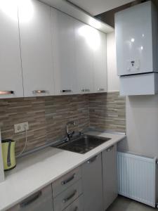 Dapur atau dapur kecil di City Center Apartment