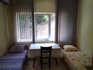 A bed or beds in a room at Apartment Nedyalkov
