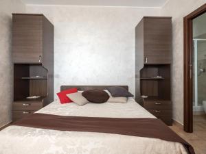 Postel nebo postele na pokoji v ubytování La casetta di richetto