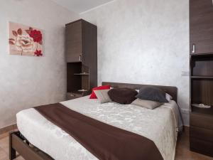 Postel nebo postele na pokoji v ubytování La casetta di richetto