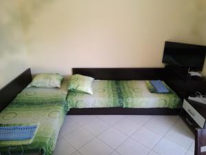 A bed or beds in a room at Apartment Nedyalkov