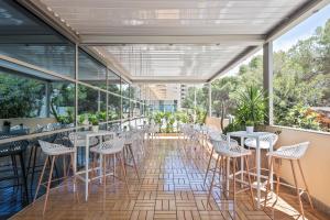 Um restaurante ou outro lugar para comer em Cullera Holiday