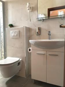 Koupelna v ubytování Villa Lucia premium rooms + 24 fotografií