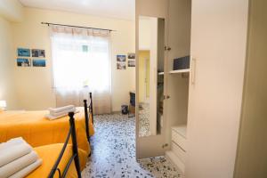 Foto da galeria de Appartamento Signorile AMBIENTI SANIFICATI em Messina