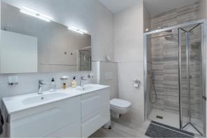 A bathroom at Luxury Beach Front Apartment with Pool