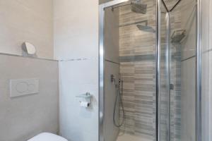 A bathroom at Luxury Beach Front Apartment with Pool