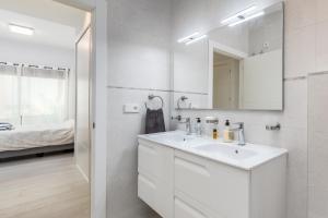 A bathroom at Luxury Beach Front Apartment with Pool
