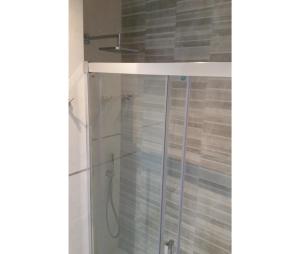A bathroom at Luxury Beach Front Apartment with Pool