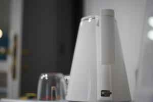 a white blender sitting on top of a counter at Me&Sea B&B in San Nicola Arcella