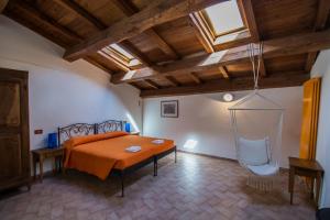 Postel nebo postele na pokoji v ubytování Agriturismo Casa Turchetti