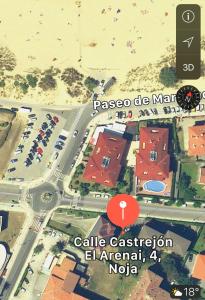 a map of a city with a red circle at Apartamento El Arenal Playa de Ris in Noja