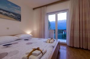 Posteľ alebo postele v izbe v ubytovaní Villa Bartul