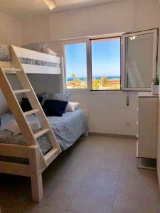 Habitación con 1 litera y 2 literas en Impresionante 1ª línea de playa..., en Fuengirola