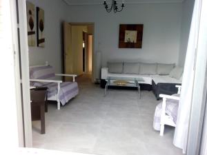 A bed or beds in a room at Luca Apartments