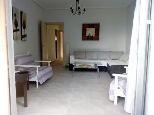 A seating area at Luca Apartments