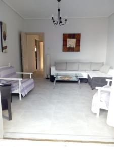 A bed or beds in a room at Luca Apartments