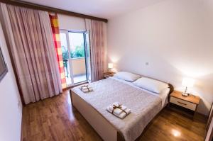 Posteľ alebo postele v izbe v ubytovaní Villa Bartul