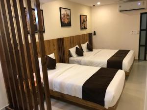 Ένα ή περισσότερα κρεβάτια σε δωμάτιο στο Apollostay
