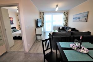 Łóżko lub łóżka w pokoju w obiekcie Apartament Superior Pastelowy Przy Plaży
